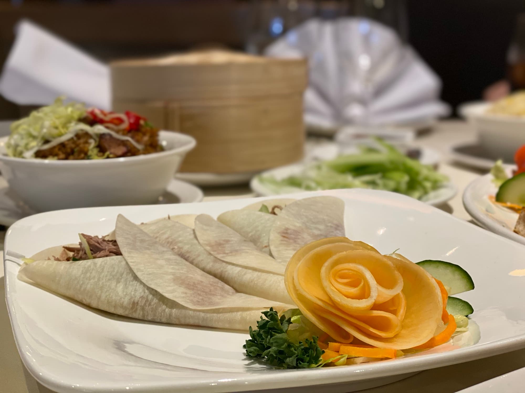 Crispy duck served with pancakes and hoisin